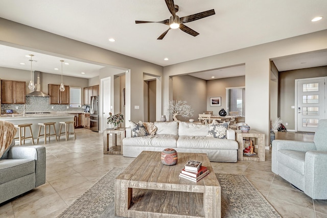 living room with ceiling fan