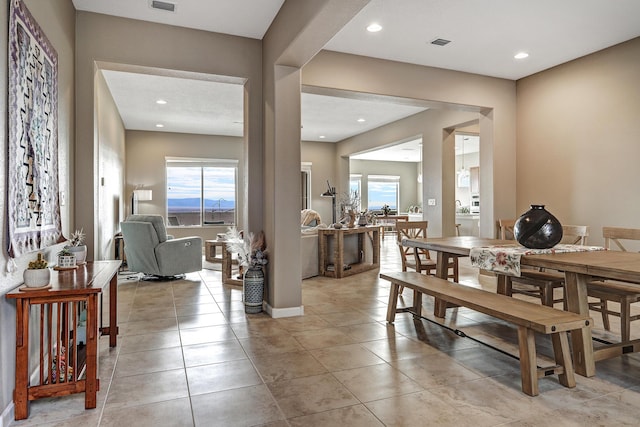 dining area featuring light tile patterned floors, visible vents, and recessed lighting