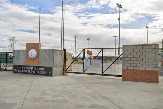 view of gate featuring fence