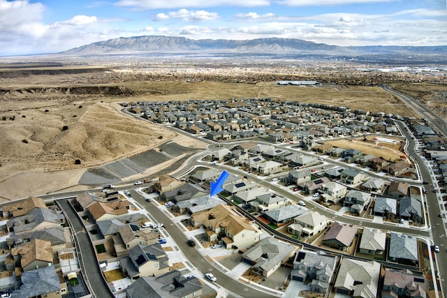 bird's eye view with a residential view and a mountain view