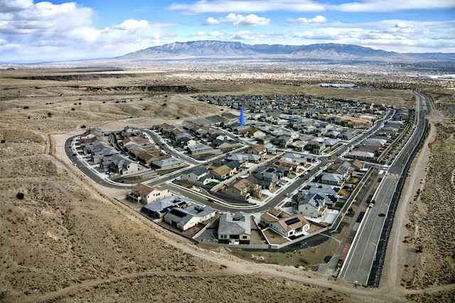 drone / aerial view featuring a mountain view