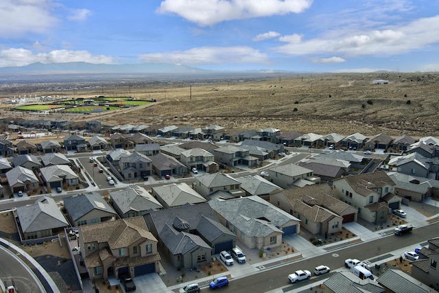 drone / aerial view featuring a mountain view