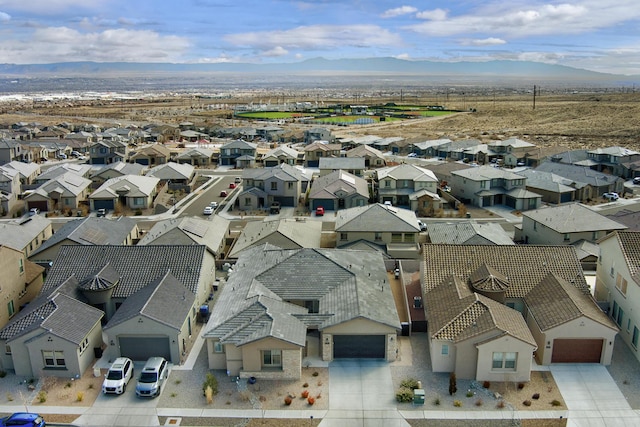 bird's eye view featuring a mountain view and a residential view