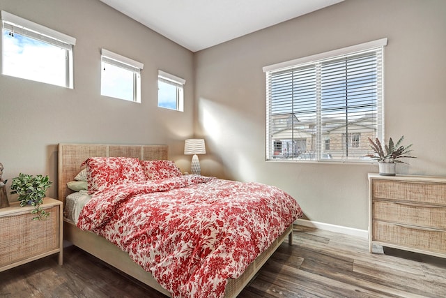 bedroom featuring dark hardwood / wood-style floors