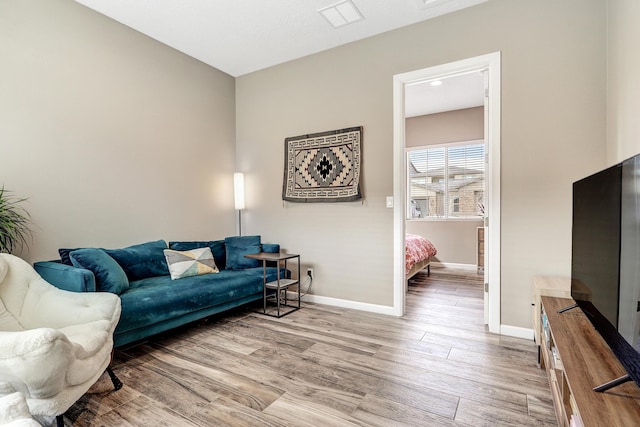 living room with wood-type flooring