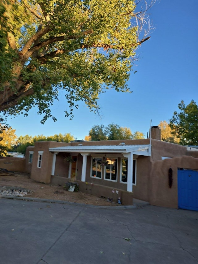 view of front of home featuring a patio area