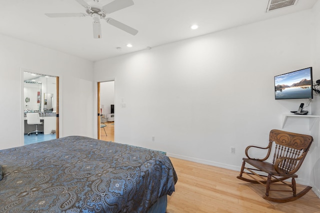 bedroom featuring wood-type flooring and ceiling fan