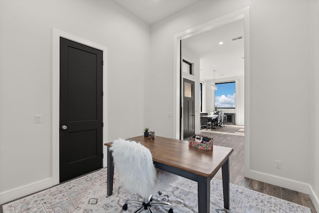 home office featuring wood-type flooring