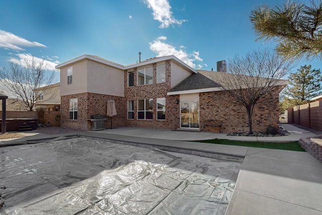 rear view of property with a patio