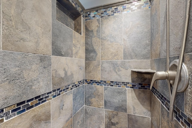 details with a tile shower