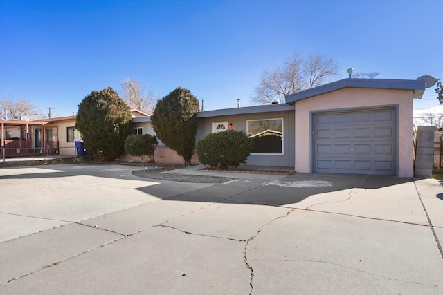 single story home featuring a garage