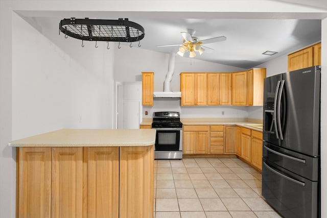 kitchen with refrigerator with ice dispenser, vaulted ceiling, gas range, light brown cabinetry, and light tile patterned floors