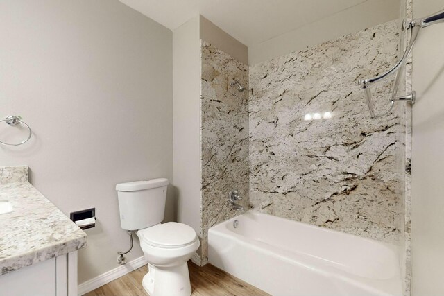 unfurnished room featuring light hardwood / wood-style floors and a textured ceiling