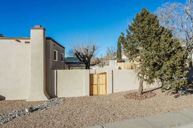 view of side of home featuring a mountain view