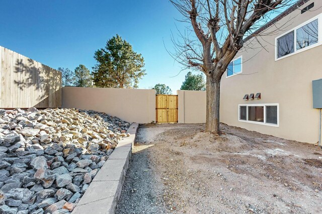 view of front of property featuring a mountain view and cooling unit