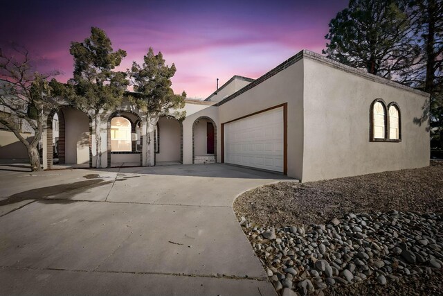 view of front of home with a garage