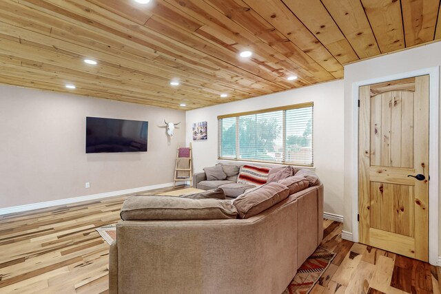 living room featuring wood ceiling and light hardwood / wood-style floors