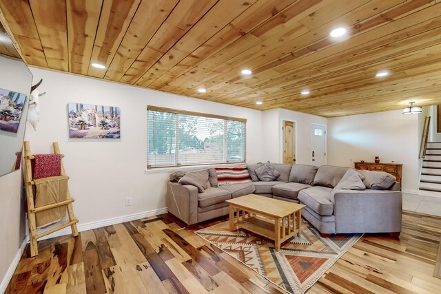 living room featuring wood ceiling and wood-type flooring