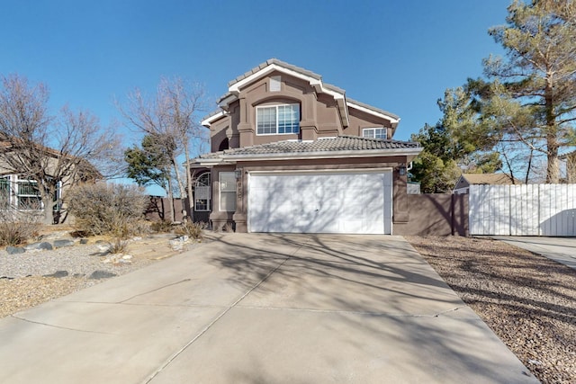 view of front of home with a garage