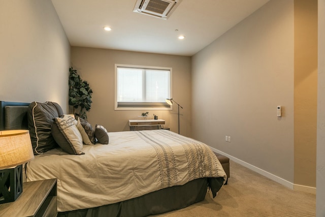 bedroom with light carpet