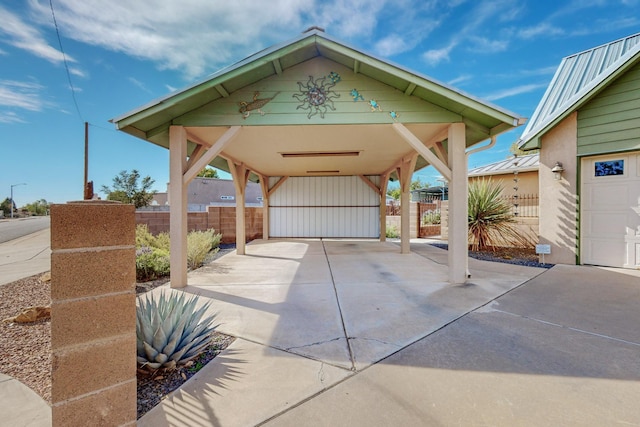 view of patio / terrace with a garage