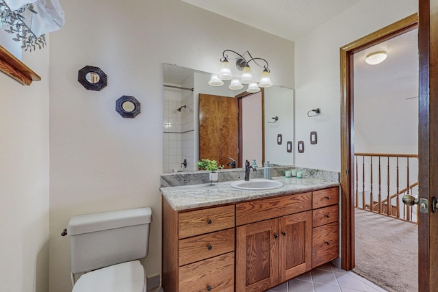 bathroom featuring walk in shower, tile patterned floors, vanity, and toilet