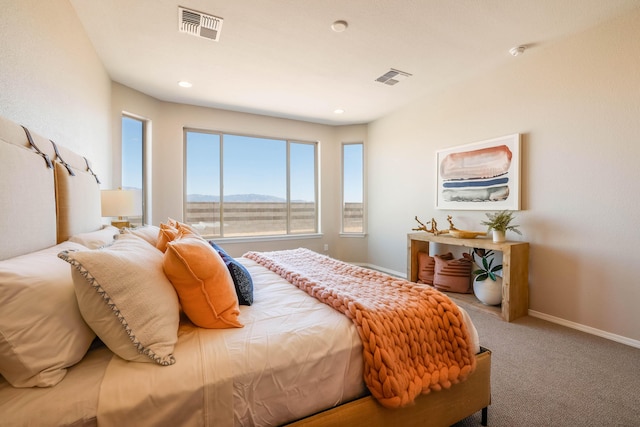 bedroom with baseboards, visible vents, a mountain view, and carpet flooring