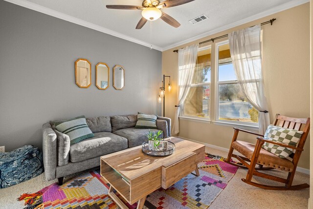 living room featuring crown molding and ceiling fan