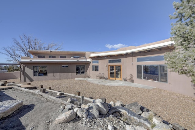 rear view of property with a patio