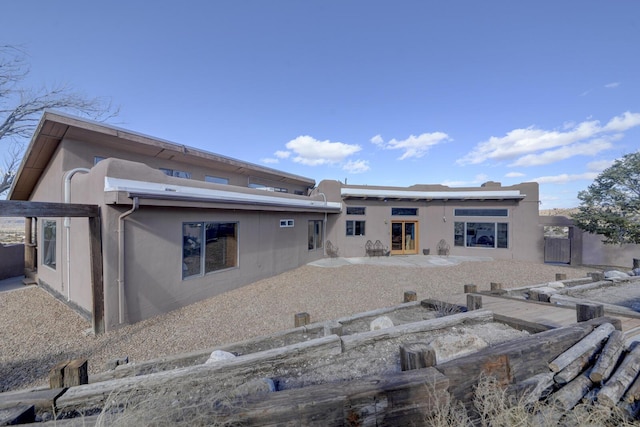 rear view of house with a patio area