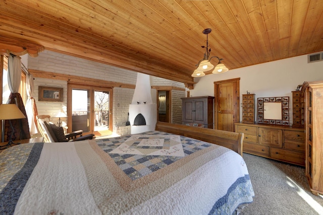 bedroom with wood ceiling, carpet, and brick wall