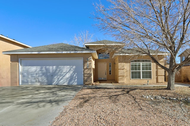 prairie-style house featuring a garage