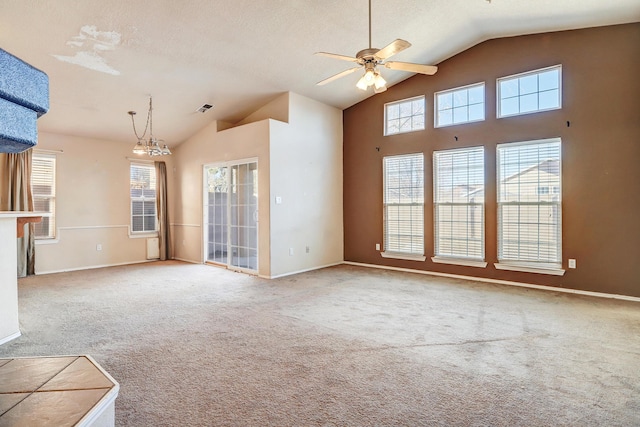 unfurnished living room with ceiling fan, light carpet, and lofted ceiling