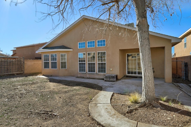 rear view of house featuring a patio area