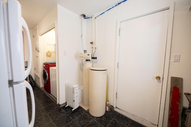 809 Kingman Ave, Grants, NM 87020 - utility room featuring radiator