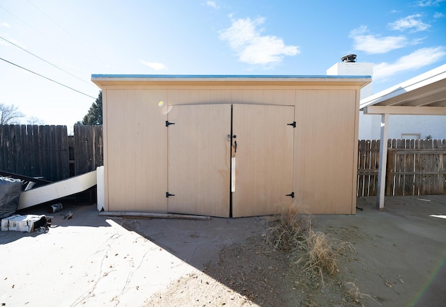 809 Kingman Ave, Grants, NM 87020 - view of shed featuring fence