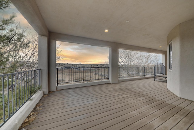 view of deck at dusk