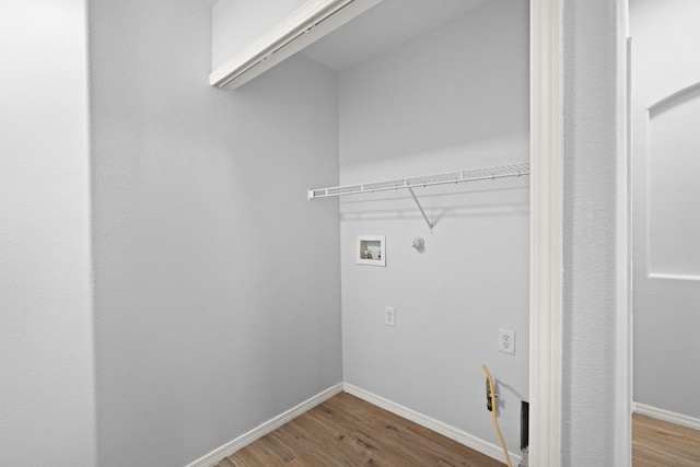 laundry room featuring hookup for a washing machine and hardwood / wood-style floors