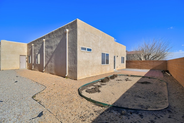 view of home's exterior with a patio