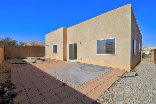 back of house featuring a patio