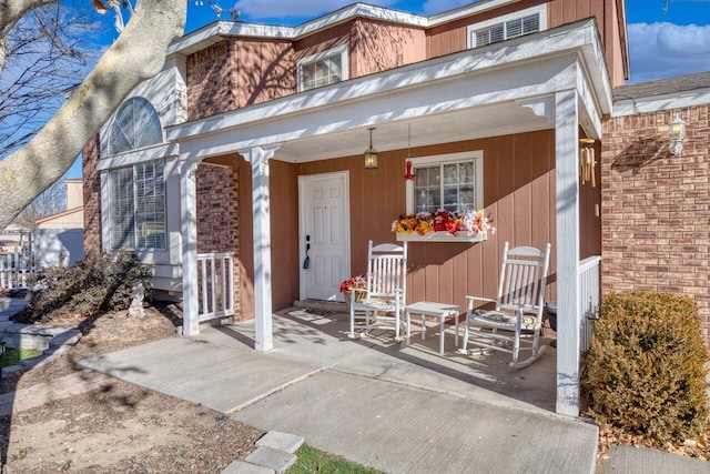 property entrance featuring covered porch