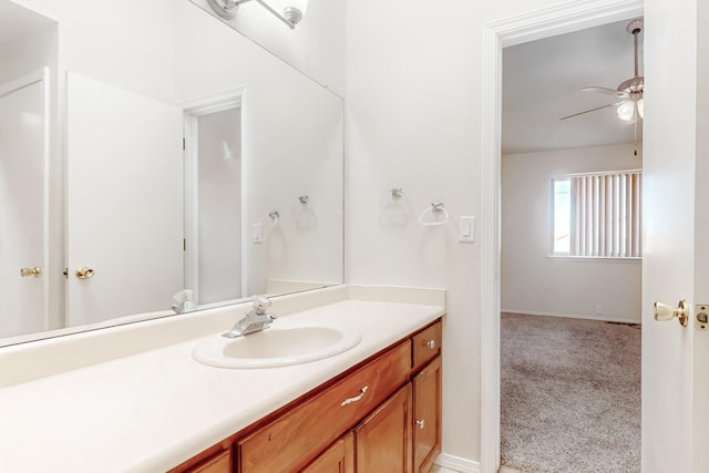 bathroom featuring vanity and ceiling fan