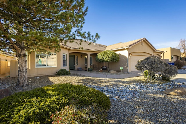 ranch-style home with a garage