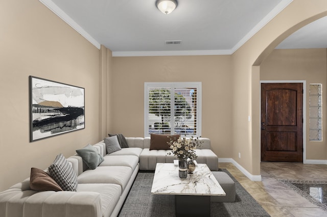 living room featuring crown molding