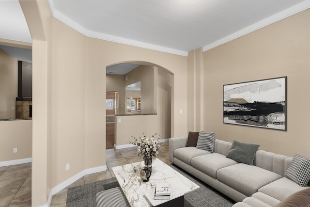 living room featuring ornamental molding and light tile patterned floors