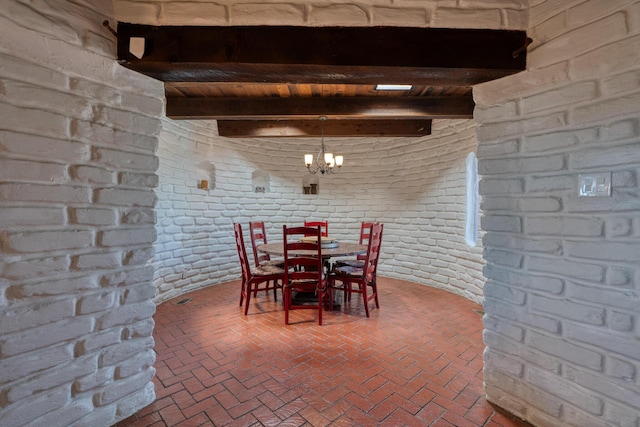 unfurnished dining area featuring wood ceiling, brick wall, beam ceiling, and a notable chandelier