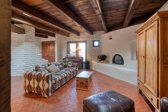 living room featuring beamed ceiling and wood ceiling