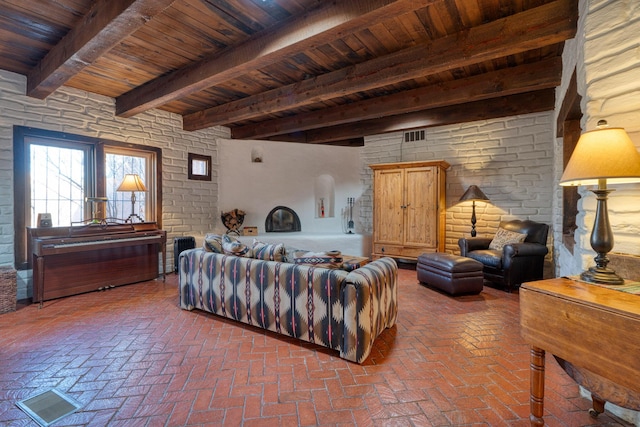 living room with beamed ceiling and wooden ceiling