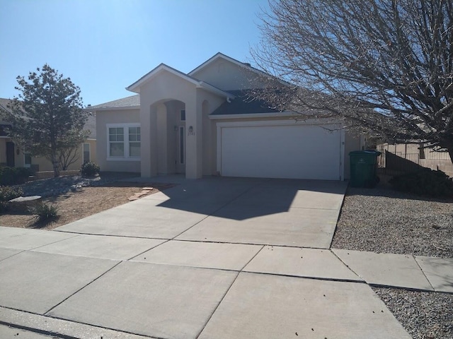 single story home featuring a garage