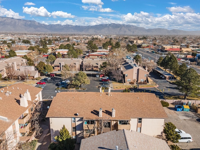 drone / aerial view featuring a mountain view